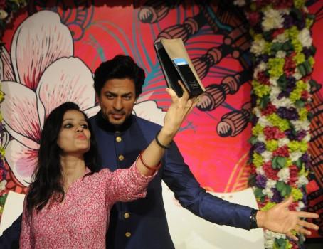 Bollywood superstar Shah Rukh Khan is the latest celebrity whose wax figure has been unveiled at Madame Tussauds here on Wednesday. The figure was also taken on a tour around parts of central and old Delhi for the fans.