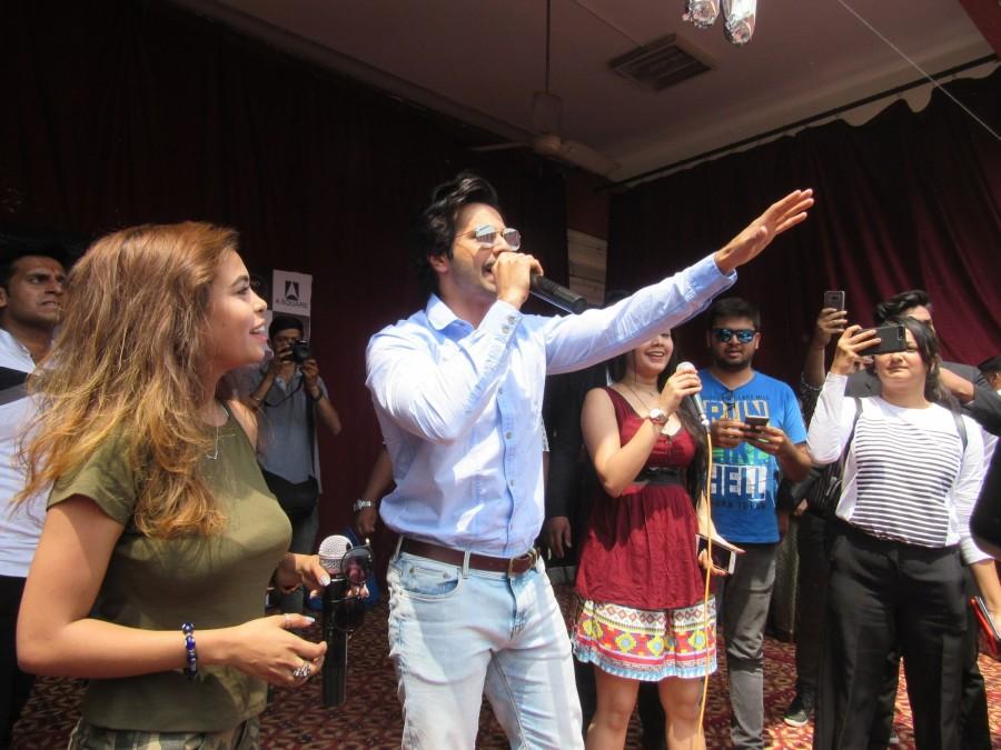 Actor Varun Dhawan interacts with the students during the promotion of his upcoming film "October" at Lakshmibai College in New Delhi on April 5, 2018. Varun Dhawan,actor Varun Dhawan,Varun Dhawan promotes October,October,October movie,October movie promotion,October movie promotion pics,October movie promotion images