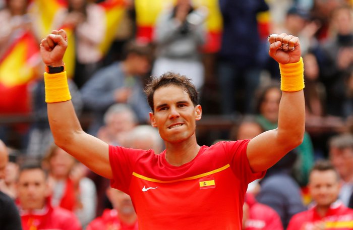 Rafael Nadal won his first singles match on his return to Davis Cup action with Spain on Friday. Nadal had not played for Spain since the tie against India two years ago, but was back to his vintage best as he claimed his 23rd singles victory in the competition with a 6-2, 6-2, 6-3 win over Philipp Kohlschreiber of Germany, Xinhua news agency reported. Rafael Nadal,Rafael Nadal wins Davis Cup,Davis Cup,Davis Cup 2018,Philipp Kohlschreiber
