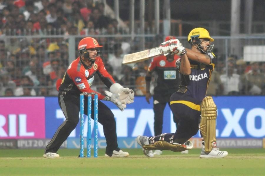 Later, Mandeep Singh's 18-ball 37 helped RCB to a challenging 176/7, but mystery spinner Narine -- used effectively as a destructive opener by KKR since last season -- made light of the target with a fiery 19-ball 50 (4x4, 5x6) along with Rana who scored a vital 25-ball 34 to steer the hosts over the line with seven balls to spare. Narine brought up his fifty in 17 balls only to perish two balls later without adding to the tally, his wicket pocketed by Umesh Yadav. Kolkata Knight Riders,Kolkata Knight Riders beat Royal Challengers Bangalore,KKR beat RCB,RCB,Royal Challengers Bangalore,Virat Kohli,IPL 2018,IPL 2018 pics,IPL 2018 images