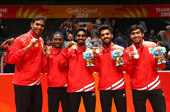 India's top-ranked singles player Sathiyan Gnanasekaran then doubled the lead with another come-from-behind victory over Segun Toriola 10-12, 11-3, 11-3, 11-4. The first game of the match went down to the wire with both the paddlers going neck and neck before the Nigerian sneaked past to take a slender 1-0 lead. Thereafter, Sathiyan came back strongly to demolish Segun's prospects in the second game and went on to dominate the Nigerian in the third and fourth games too as India's lead swelled to 2-0. CWG 2018,Commonwealth Games,Commonwealth Games 2018,table tennis team,Achanta Sharath Kamal,Bode Abiodun