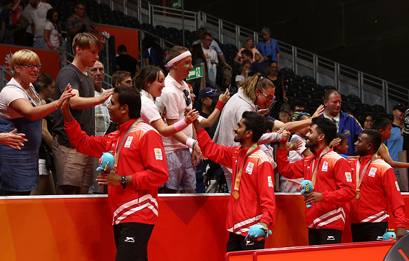 High on confidence, the Indian duo hardly lost a sweat to pocket the third game, leading to loud celebrations from the Indian camp on clinching the historic gold. With the loss, Nigeria bagged the silver while England settled for the bronze after defeating Singapore. This is India's second gold medal in table tennis team event after the women's team claimed the yellow medal by drubbing highly-fancied Singapore on Sunday. CWG 2018,Commonwealth Games,Commonwealth Games 2018,table tennis team,Achanta Sharath Kamal,Bode Abiodun