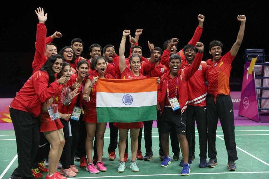 India's mixed badminton team put up a commanding show to clinch its maiden gold medal, defeating three-time defending champions Malaysia 3-1 in the final of the event at the 21st Commonwealth Games (CWG) here on Monday. Kidambi Srikanth, Saina Nehwal and the mixed doubles pair of Satwiksairaj Rankireddy and Ashwini Ponnappa all won a match each to guide India power past Lee Chong Wei-spearheaded Malaysia which was winning gold since the 2006 CWG. CWG 2018,Commonwealth Games,Commonwealth Games 2018,Kidambi Srikanth,Saina Nehwal,Satwiksairaj Rankireddy,Ashwini Ponnappa