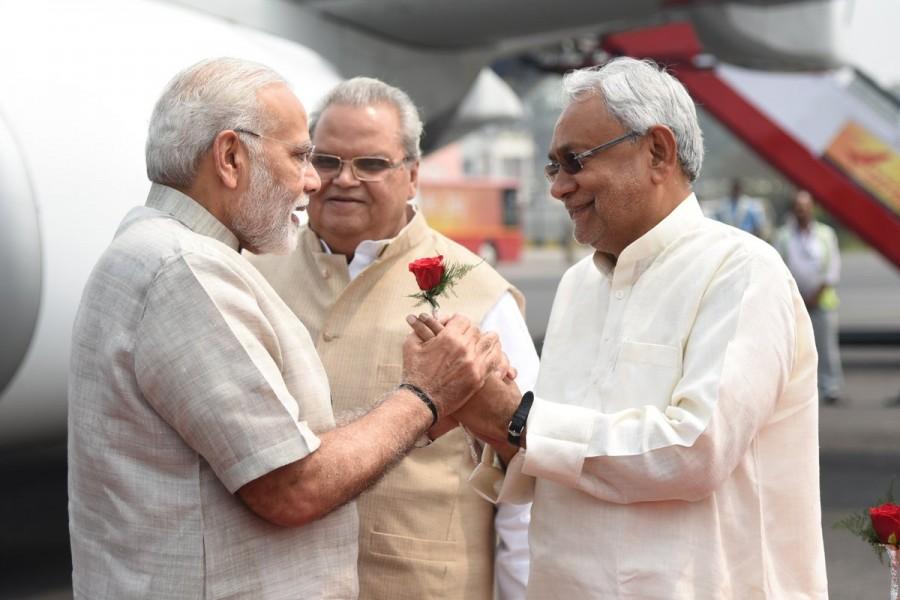 Prime Minister Narendra Modi arrived here on Tueesday to attend the concluding ceremony of the Champaran Satyagraha's of centenary celebrations in Motihari. Modi was recieved by Bihar Governor Saatyapal Malik, Chief Minister Nitish Kumar, Union Minister Ram Vilas Paswan and several senior BJP leaders. Accordding to police officials, Modi reached Patna in an Indian Air Force aircraft and will go to Motihari by a helicopter. The Prime Minister is slated to address 20,000 'Swachhagrahis' (cleanliness ambassadors). Narendra Modi,PM Narendra Modi,Prime Minister Narendra Modi,Modi arrives Bihar,Modi in Bihar,Champaran Satyagraha,Champaran Satyagraha celebrations,Champaran Satyagraha celebrations pics,Champaran Satyagraha celebrations images