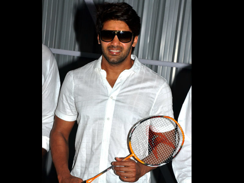South Indian actor Arya poses for the cameras during badminton academy launch in Chennai. Arya,actor Arya,Ajay Rathnam,Ajay Rathnam badminton academy,Ajay Rathnam badminton academy launch,Ajay Rathnam badminton academy pics,Ajay Rathnam badminton academy images