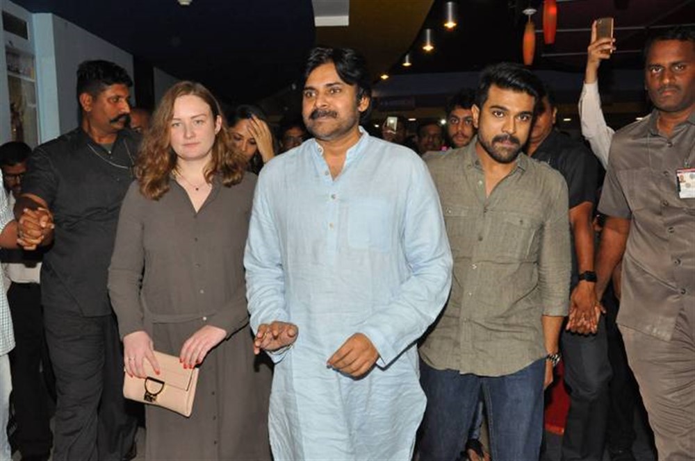 The bond between actor Pawan Kalyan and his nephew Ram Charan seems to be growing stronger. Janasena Chief Pawan recently watched Charan's Rangasthalam movie with his family at Imax, Hyderabad. He also appreciated his nephew's performance in Rangasthalam. Pawan Kalyan,actor Pawan Kalyan,Pawan Kalyan watches Rangasthalam,Rangasthalam,Rangasthalam movie,Ram Charan,Pawan Kalyan with family
