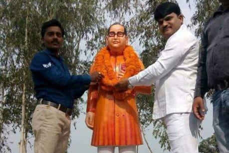 After facing flak over installing a saffron colour statue of Dalit icon B.R. Ambedkar, district authorities in Budayun in Uttar Pradesh on Tuesday changed its colour to the blue. The saffron statue, unlike the usual blue, was installed in Dugraiyya village on Monday after the earlier one was vandalized on Saturday. BR Ambedkar,dugraiyya,Badaun,Dalits,Ambedkar statue,Ambedkar statue turns blue,Ambedkar blue statue