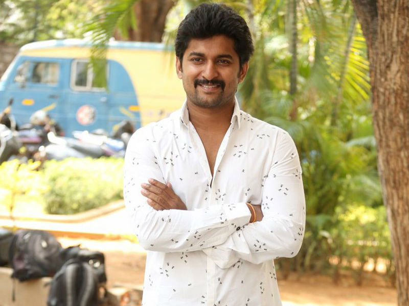 Natural star Nani gets clicked on his arrival during Krishnarjuna Yudham movie press meet. Krishnarjuna Yudham press meet,Krishnarjuna Yudham,Nani,Merlapaka Gandhi,Nani at Krishnarjuna Yudham press meet,Krishnarjuna Yudham press meet pics,Krishnarjuna Yudham press meet images,Dil Raju