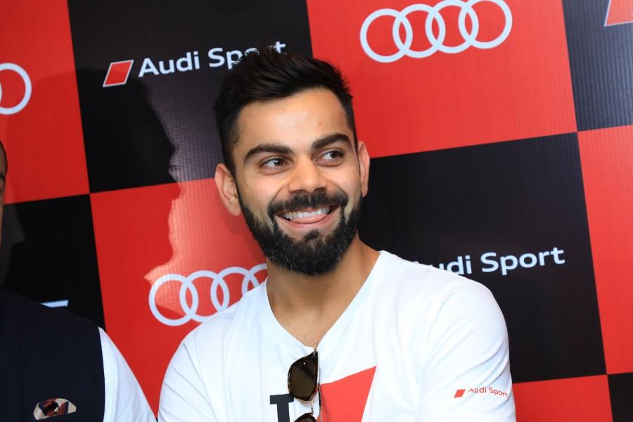 Indian Cricket Team Captain Virat Kohli at the Audi RS 5 Coupe Launch In Bangalore. Virat Kohli,Audi RS 5 Coupé,Audi RS 5 Coupé in India,Audi RS 5 Coupé pics,Audi RS 5 Coupé images,German luxury car