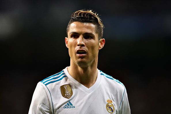 Cristiano Ronaldo of Real Madrid looks on during the UEFA Champions League Quarter Final, second leg match between Real Madrid and Juventus at Estadio Santiago Bernabeu on April 11, 2018 in Madrid, Spain. Cristiano Ronaldo goes shirtless,Cristiano Ronaldo shirtless,Cristiano Ronaldo,Real Madrid,Champions League,Champions League semi-final,Cristiano Ronaldo 150th match,Champions League pics,Champions League images