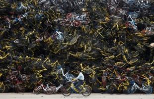 Chinese bike graveyard,bike graveyard,bike graveyard pics,bike graveyard images,bike-sharing graveyards,abandoned bikes