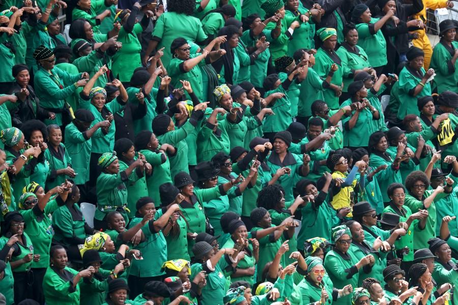 Mourners attend a memorial service for Winnie Madikizela-Mandela at Orlando Stadium in Johannesburg's Soweto township. Winnie Mandela,Winnie Madikizela-Mandela,Tributes to Winnie Mandela,South Africans paid tribute