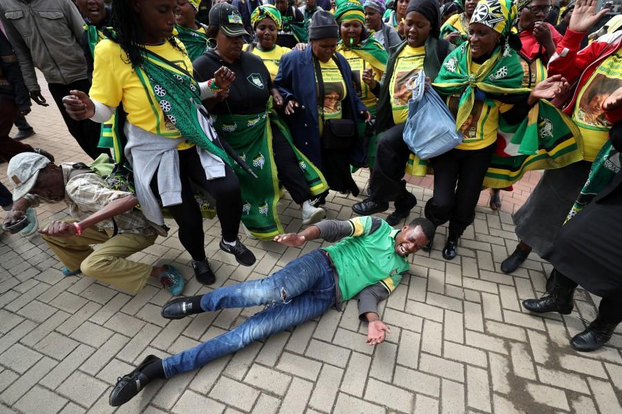 Mourners dance at a memorial service for Winnie Madikizela-Mandela at Orlando Stadium in Johannesburg's Soweto township, South Africa April 11, 2018. Winnie Mandela,Winnie Madikizela-Mandela,Tributes to Winnie Mandela,South Africans paid tribute