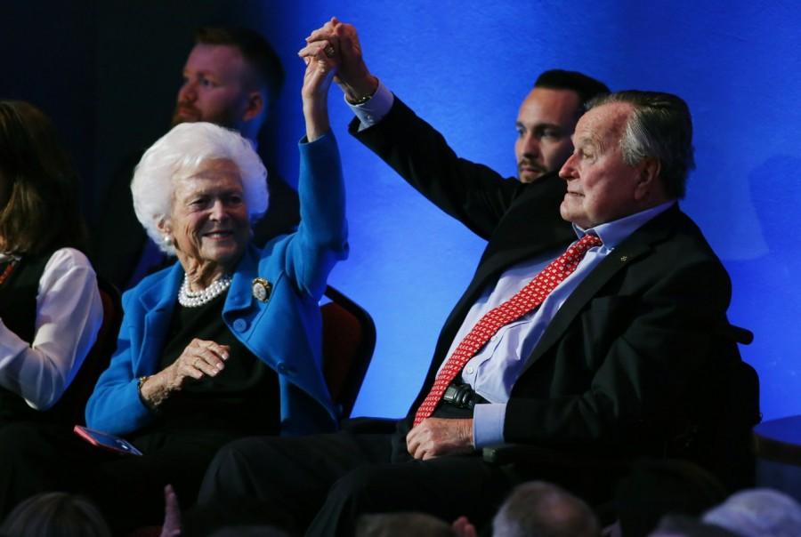 Former U.S. President George H.W. Bush raises hands with his wife, former first lady Barbara Bush as they await the start of the Republican U.S. Presidential candidates debate sponsored by CNN in Houston, Texas, February 25, 2016. Barbara Bush passes away,Barbara Bush,Barbara Bush dead,Barbara Bush passes,former First Lady,Barbara Bush rare pics,Barbara Bush rare images,Barbara Bush rare unseen pics,Barbara Bush rare unseen images
