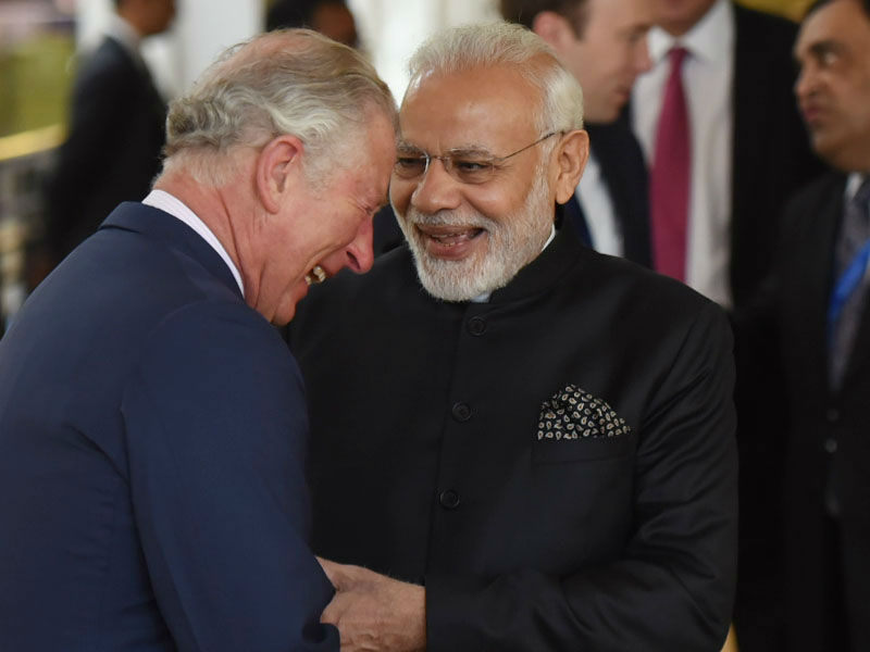 Prime Minister Narendra Modi shares a light moment with Prince Charles during his visit to the science museum, to view an exhibition on 5000 years of Science and Innovation, in London on April 18, 2018. PM Narendra Modi,Narendra Modi,Modi meets Prince Charles,Prince Charles,Modi in London,PM Modi in London