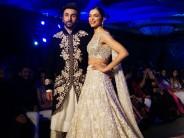 Bollywood actors Deepika Padukone and Ranbir Kapoor set the ramp on fire at "The Walk of Mijwan" on Thursday night flaunting the outfit designed by ace designer Manish Malhotra. The duo looked stunning as showstopper, wearing beautifully embroiders dress from the collection of Manish. Ranbir dressed in black floral embroider sherwani and Deepika wore a pearlescent lehenga designed with heritage embroidery that celebrated the craft of needle.