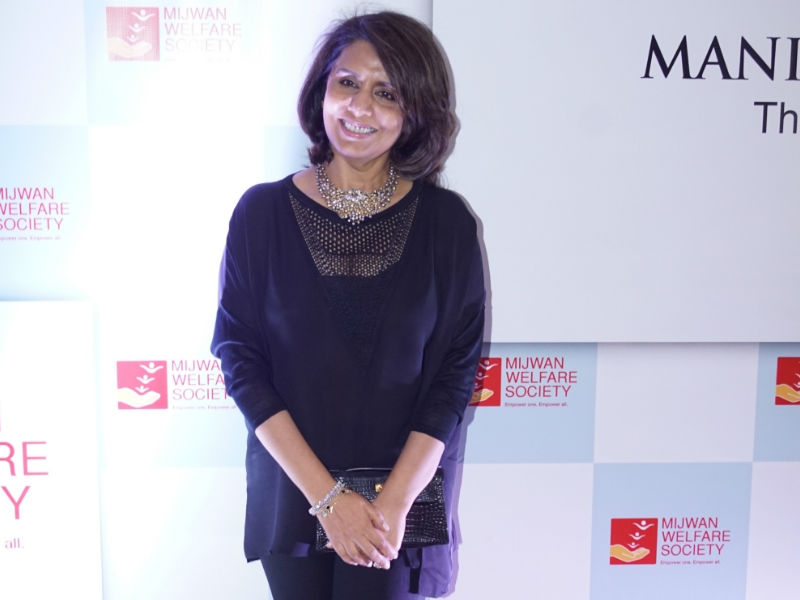 Actress Neetu Kapoor poses for the cameras on her arrival at Manish Malhotra's fashion show in Mumbai on April 19, 2018. Mouni Roy,Sonakshi Sinha,Sooraj Pancholi,Nandita Das,Sonali Bendre,Manish Malhotra,Manish Malhotra show,celebs at Manish Malhotra show,Manish Malhotra show pics,Manish Malhotra show images