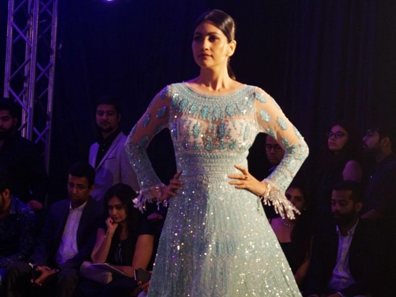 A Model showcases creation of fashion designer Manish Malhotra at "The Walk of Mijwan" in Mumbai on April 19, 2018. Mouni Roy,Sonakshi Sinha,Sooraj Pancholi,Nandita Das,Sonali Bendre,Manish Malhotra,Manish Malhotra show,celebs at Manish Malhotra show,Manish Malhotra show pics,Manish Malhotra show images