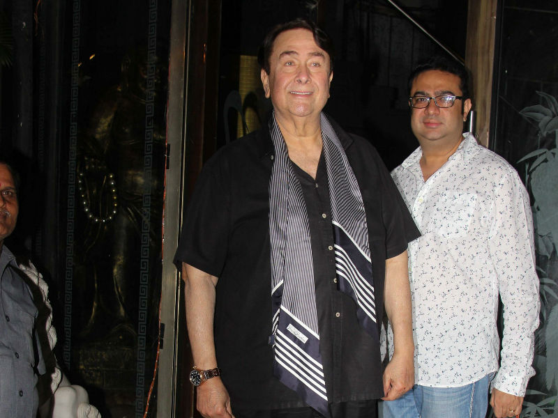 Randhir Kapoor waves to the photographers as he arrives during Babita Kapoor's birthday party in Mumbai. Kareena Kapoor Khan,babita kapoor 70th birthday photos,karisma kapoor,kareena kapoor khan saif ali khan,Babita Kapoor,Babita Kapoor's birthday,celebs at Babita Kapoor,Babita Kapoor birthday pics,Babita Kapoor birthday images