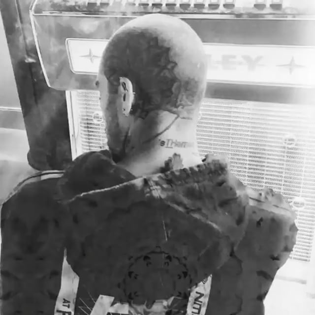 Singer Zayn Malik has added to his collection of body tattoos. This time, he has got inked on his shaved head. The "Pillowtalk" singer, 25, shared a photo of himself on Instagram on Friday night with no caption. The photo, taken in black and white with a psychedelic effect to it creating swirls moving about on his black jacket, showed Malik with his back to the camera as he revealed the left side of his head, shaved and bearing what looked like a tattoo behind his left ear. Singer Zayn Malik,Zayn Malik,Zayn Malik tattoos,Zayn Malik head tattoos,Zayn Malik body tattoos,Zayn Malik shaved head