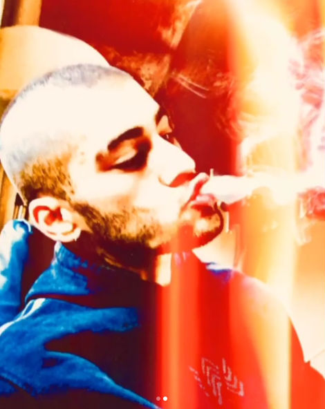 His ex, Hadid liked the photo on Instagram, just one day after the singer was photographed visiting the 22-year-old at her home on Thursday and spotted leaving the next day in the same hoodie he wore the night before. Singer Zayn Malik,Zayn Malik,Zayn Malik tattoos,Zayn Malik head tattoos,Zayn Malik body tattoos,Zayn Malik shaved head