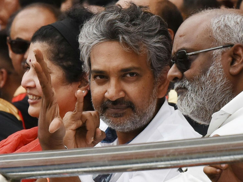 Baahubali director SS Rajamouli seen relaxed and cheering at the Stadium. Filmmaker was spotted with his wife Rama Rajamouli and Music Director MM Keeravani at an IPL match at Rajiv Gandhi International Cricket Stadium during Chennai Super Kings and Sunrisers Hyderabad match. SRHvs CSK,Sunrisers Hyderabad,SS Rajamouli and Keeravani,SS Rajamouli,Keeravani,SS Rajamouli at IPL,SS Rajamouli during IPL,Baahubali director