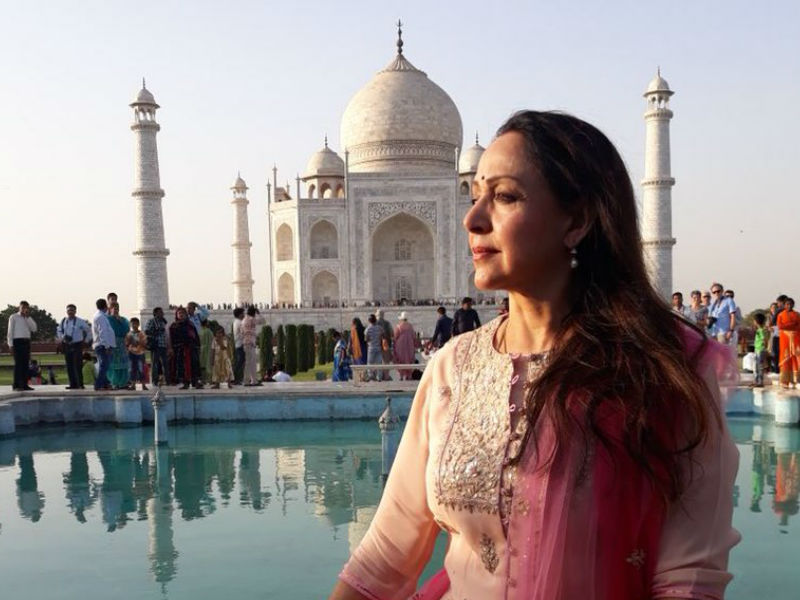 Bollywood actress and BJP leader Hema Malini visits Taj Mahal in Agra on Sunday. Actress Hema Malini took social media and shared a picture on Twitter with the caption, "In Mathura for the grihapravesh of my house that I have made here. Arre! In Mathura & haven’t had time to visit Taj in Agra which is just an hour away? So went on an impromptu visit & Wow! Saw the Pride of India & drank in the beauty to my heart’s content! So happy I cud do it!." Hema Malini visits Taj Mahal,Hema Malini at Taj Mahal,Hema Malini,actress Hema Malini,politician Hema Malini,Hema Malini with his brother,Hema Malini pics,Hema Malini images