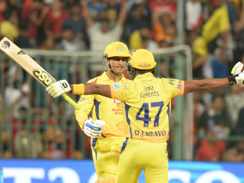 Mahendra Singh Dhoni (70 not out off 34 deliveries) and Ambati Rayudu's 53-ball 83 helped Chennai Super Kings (CSK) register a thumping five-wicket win over Royal Challengers Bangalore (RCB) here on Wednesday to return to the top spot of the Indian Premier League (IPL). Chasing a massive total of 206 runs, Dhoni was at his explosive best, blasting seven sixes as the visitors won with five wickets and two deliveries to spare clash at the M. Chinnaswamy Stadium. The veteran skipper was well supported by opener Rayudu, who slammed four boundaries and eight sixes as CSK took their points tally to 10, while RCB remained in the sixth spot with four points. Chennai Super Kings,Royal Challengers Bangalore,Chennai Super Kings vs Royal Challengers Bangalore,CSK beats RCB,IPL 2018,IPL,Indian Premier League,Indian Premier League 2018,Indian Premier League pics,Indian Premier League images