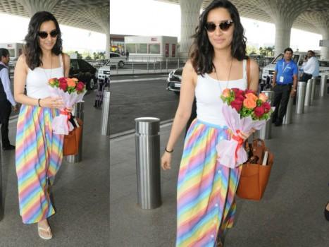 When it comes to style, Bollywood actress Shraddha Kapoor knows how to top the game. Be it a promotional event or a casual outing, the pretty actress brings her A-game every time she steps out. Shraddha was recently snapped by the shutterbugs at the airport wearing a MD Stripes Button front skirt. Keeping it cool and casual at the airport the actress nailed the airport look.