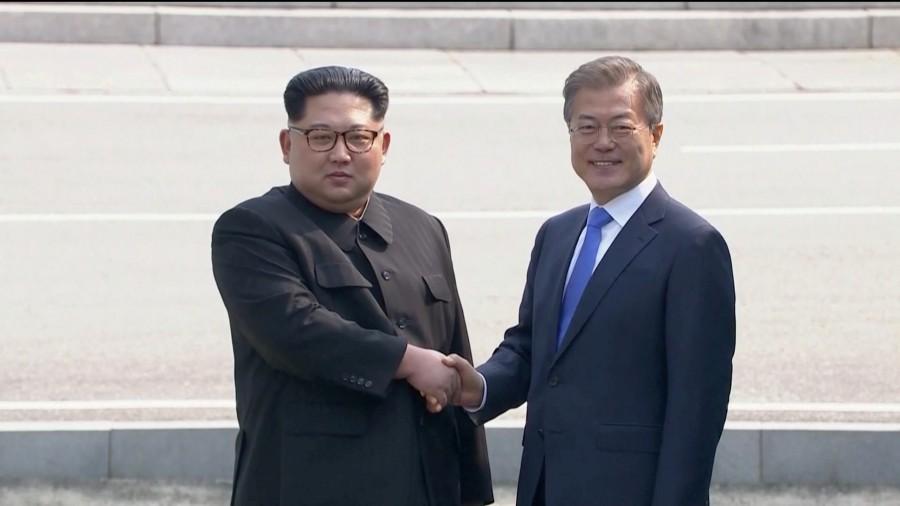 South Korean President Moon Jae-in greeted Kim Jong Un, top leader of North Korea on Friday and become the first North Korean leader to set foot in South Korea by crossing the military line that has divided the peninsula since the end of the Korean War in 1953. Smiling and waving, South Korean President Moon Jae-in met Kim at the border before talks begin. The leaders were met by an honour guard in traditional costume on the South Korean side. The pair walked to the at the Peace House in Panmunjom, a military compound in the demilitarised zone (DMZ) between the two countries, to begin talks. North Korea leader Kim Jong Un,Kim Jong Un,Kim Jong Un with President Moon Jae-in,President Moon Jae-in,Moon Jae-in,Kim Jong Un and Moon Jae-in,Korea summit
