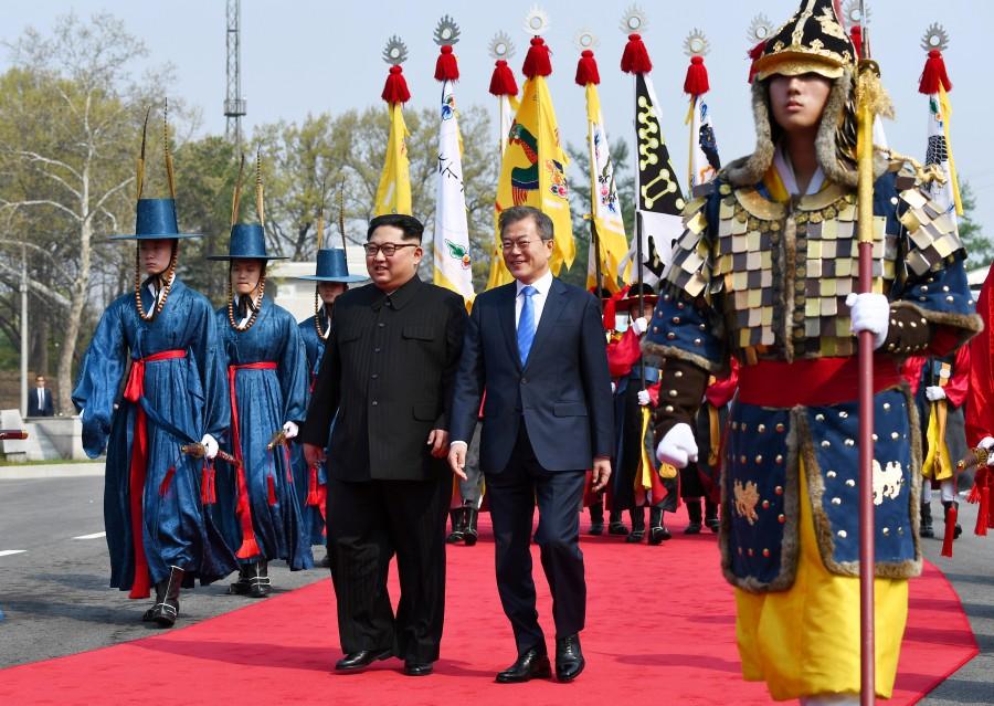 South Korean President Moon Jae-in and North Korean leader Kim Jong Un meet in the truce village of Panmunjom inside the demilitarized zone separating the two Koreas, South Korea, April 27, 2018. North Korea leader Kim Jong Un,Kim Jong Un,Kim Jong Un with President Moon Jae-in,President Moon Jae-in,Moon Jae-in,Kim Jong Un and Moon Jae-in,Korea summit
