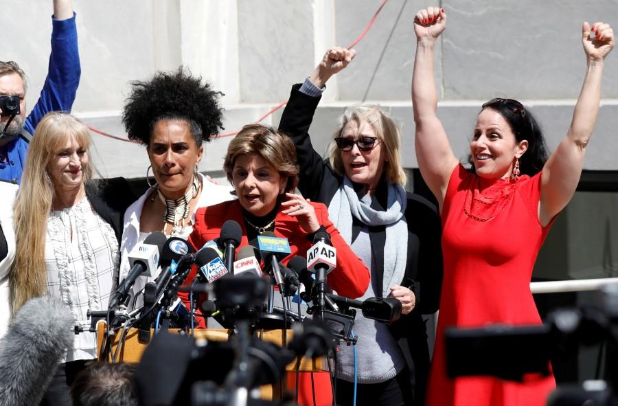 Attorney Gloria Allred stands with accusers of actor and comedian Bill Cosby after a jury convicted him in a sexual assault retrial at the Montgomery County Courthouse in Norristown, Pennsylvania, U.S., April 26, 2018. Bill Cosby,actor Bill Cosby,Comedian Bill Cosby,sexual assault,Andrea Constand