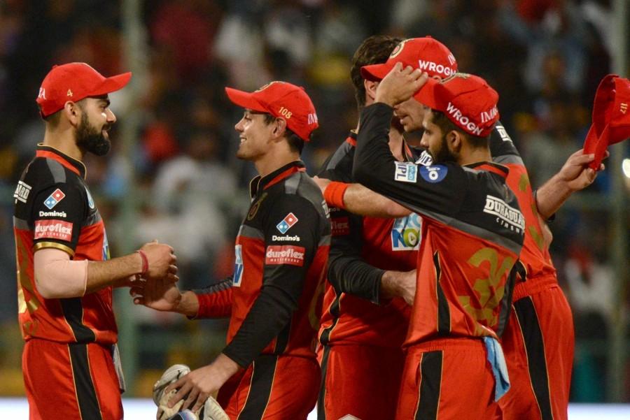 Mumbai's chase ran into trouble right from the start as they lost their entire top order in the first seven overs before the total had reached the 50-run mark. Kiwi pacer Tim Southee struck the first blow when he bowled Ishan Kishan in the first over. Fellow pacer Umesh Yadav struck in the fourth over when he sent back the other opener Suryakumar Yadav and Mumbai Indians skipper Rohit Sharma off successive deliveries in the fourth over. The dangerous duo of Kieron Pollard and Jean-Paul Duminy seemed to have stemmed the rot for a brief period when they put together 26 runs in the span of four overs. Royal Challengers Bangalore beat Mumbai Indians,RCB beat MI,Virat Kohli,Indian Premier League,Indian Premier League 2018,Indian Premier League pics,Indian Premier League images,IPL pics,IPL images,IPL stills