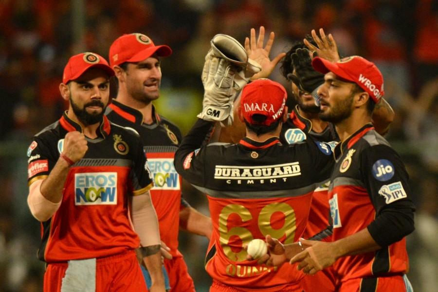 Pacer Mohammed Siraj separated the duo when Pollard edged one to Quinton de Kock. When Duminy was run out in the 12th over, Mumbai were in trouble at 84/5. The two Pandya brothers - Hardik and Krunal - however gave a tough fight to the RCB bowlers with a 56-run stand off 39 balls. But when Krunal miscued an attempted reverse scoop off Siraj to hand an easy catch to Mandeep Singh at backward point, it was as good as game over for Mumbai. The RCB pace trio of Southee, Siraj and Umesh claimed two wickets each. Earlier, a disciplined bowling effort by Mumbai restricted RCB to a moderate 167/7. Royal Challengers Bangalore beat Mumbai Indians,RCB beat MI,Virat Kohli,Indian Premier League,Indian Premier League 2018,Indian Premier League pics,Indian Premier League images,IPL pics,IPL images,IPL stills