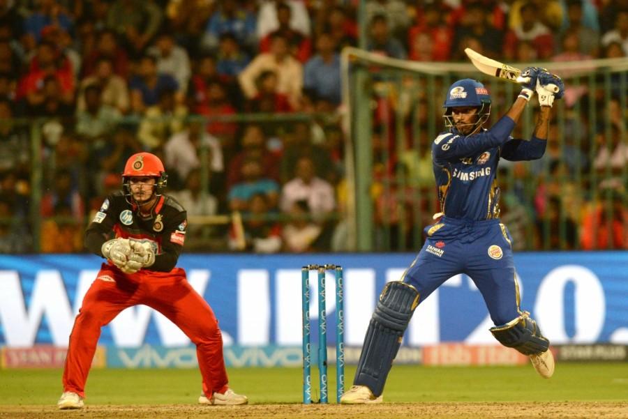 McCullum ran himself out while trying to take a single with the Bangalore scorecard reading 121/3. Kohli then tried to take Bangalore forward with Mandeep Singh (14 off 10) however, medium-pacer Hardik Pandya's double blow in the 17th over put the hosts on the back-foot. He sent both the batters back to the dug out on successive deliveries to send Bangalore reeling at 139/5. A 10-ball 23 by Colin de Grandhomme in the final moments, however, helped the hosts reach a fighting total despite Washington Sundar (1) and Tim Southee (1) failing to fire. For Mumbai, Hardik Pandya was the pick of the bowlers with figures of 3/28 while Markande, McClenaghan and Jasprit Bumrah bagged a wicket each. Royal Challengers Bangalore beat Mumbai Indians,RCB beat MI,Virat Kohli,Indian Premier League,Indian Premier League 2018,Indian Premier League pics,Indian Premier League images,IPL pics,IPL images,IPL stills