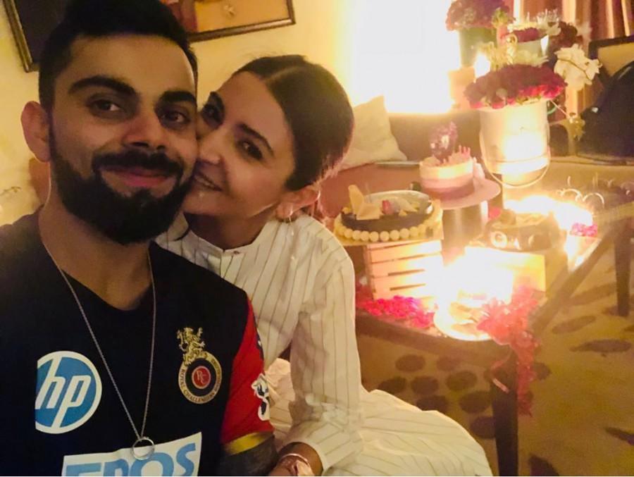Royal Challengers Bangalore captain Virat Kohli celebrates his wife Anushka Sharma's 30th birthday after defeating Mumbai Indians by 14 runs in Bangalore. The Indian skipper took his time to make some special arrangements for his better half's first birthday after their marriage. Actress Anushka shared a picture on her Instagram page with the caption: "Best birthday with the bestest, kindest, bravest man in the world . Love you for making it so special my love ❤ ! Virat Kohli,virat kohli anushka sharma,Anushka Sharma,Anushka Sharma 30th birthday,Anushka Sharma birthday celebration,Anushka Sharma birthday celebration pics,Virat Kohli celebrates Anushka Sharma birthday