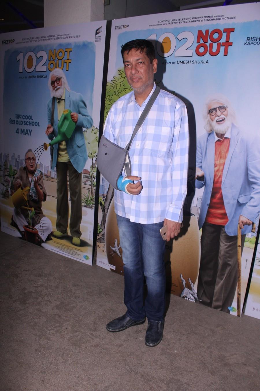 Taran Adarsh poses for photographers on his arrival at the special screening of ‘102 Not Out’ in Mumbai Amitabh Bachchan and Rishi Kapoor,Amitabh Bachchan,Rishi Kapoor,Abhishek Bachchan,Aishwarya Rai,Ranbir Kapoor,Taapsee Pannu,102 Not Out,102 Not Out special screening,102 Not Out special screening pics,102 Not Out special screening images,102 Not Out pics