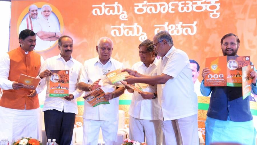 The document proposes to waive off all farmers' loans upto Rs 1 lakh from nationalised banks and cooperative banks in the very first state Cabinet meeting. Assembly elections are due on May 12. The party said it will support about 20 lakh small and marginal dry land farmers through a direct income support of Rs 10,000. Karnataka assembly elections 2018,Karnataka assembly elections,Karnataka elections 2018,Karnataka elections,BJP manifesto,BS Yeddyurappa,BS Yeddyurappa releases BJP manifesto,Prakash Javadekar,Muralidhar Rao,MP PC Mohan,Jagadish Shetter