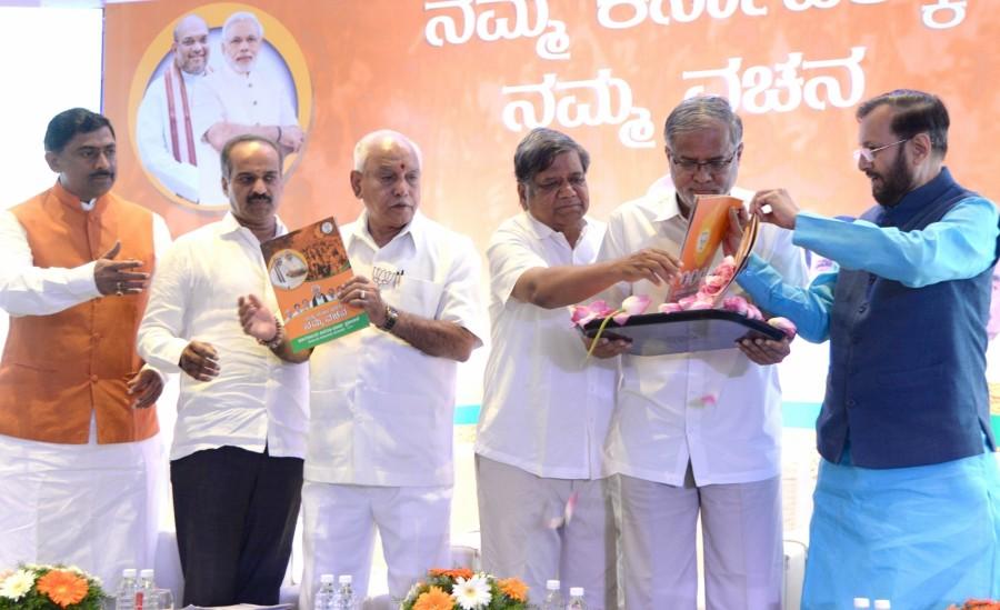 The BJP leader said the party will earmark Rs 10,000-crore for a "Stree Unnati" Fund to set up women-run cooperatives across the state and establish stores to market the products made by the women at district and sub-district headquarters. The party said it would ensure more work opportunities in the state, but did not specify the number of jobs it aimed to create. The BJP also said it will reintroduce the Karnataka Prevention of Cow Slaughter and Preservation Bill, 2012. Karnataka assembly elections 2018,Karnataka assembly elections,Karnataka elections 2018,Karnataka elections,BJP manifesto,BS Yeddyurappa,BS Yeddyurappa releases BJP manifesto,Prakash Javadekar,Muralidhar Rao,MP PC Mohan,Jagadish Shetter