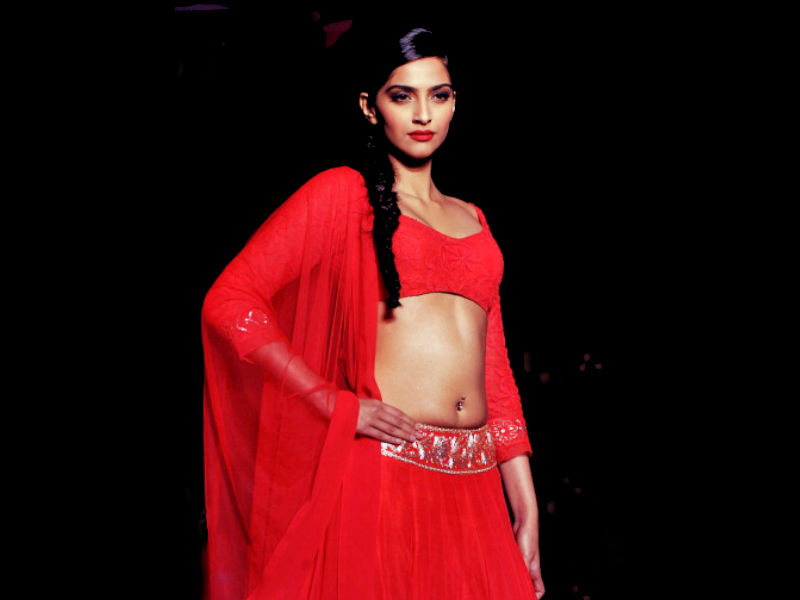 10) Indian Bollywood actress Sonam Kapoor showcases a design by designer Manish Malhotra during a product launch in Mumbai on April 25, 2013. Sonam Kapoor wedding,Sonam Kapoor marriage,Veere Di Wedding actress,Sonam Kapoor bride,Sonam Kapoor bride look,Sonam Kapoor bride look pics,Sonam Kapoor bride look images,sonam kapoor anand ahuja,Sonam Kapoor wedding pics,Sonam Kapoor wedding images,Sonam