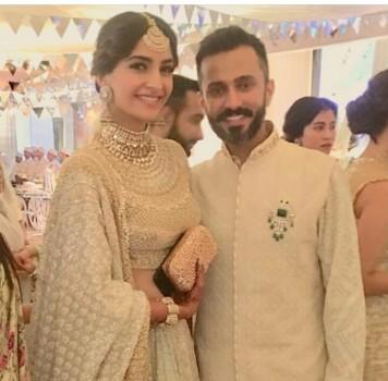Actress Sonam Kapoor was elegance personified as she chose to be in sync with the 'shades of white' dress code for her sangeet ceremony here on Monday evening, a day before her wedding to Delhi-based businessman Anand Ahuja. Sonam wore a traditional dress that featured a heavily-embroidered gold blouse and ivory-gold lehena. She matched the dress with traditional jewellery -- jadau neckpiece, maang-tika and jhumkas. Her hair was neatly done up in a long braid and adorned with a white garland. The sangeet ceremony took place at the Sunteck Signature Island.