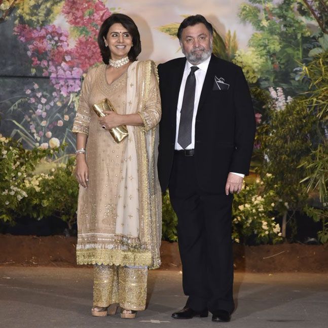 Neetu and Rishi Kapoor at Sonam Kapoor-Anand Ahuja's wedding reception. Sonam Kapoor,Sonam Kapoor and Anand Ahuja,Sonam Kapoor and Anand Ahuja wedding reception,Sonam Kapoor and Anand Ahuja wedding reception pics,Sonam Kapoor wedding reception,Sonam Kapoor wedding reception pics