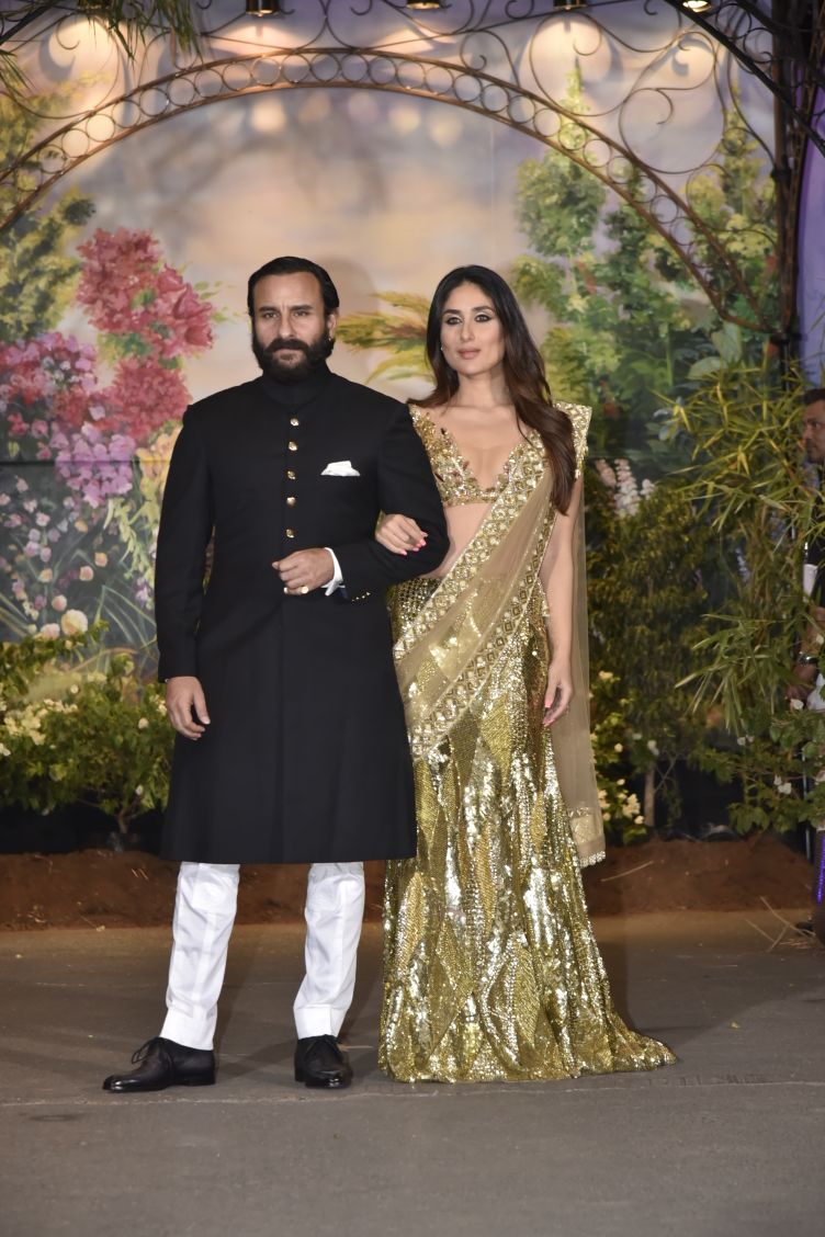 Saif Ali Khan and Kareena Kapoor Khan at Sonam Kapoor-Anand Ahuja's wedding reception. Sonam Kapoor,Sonam Kapoor and Anand Ahuja,Sonam Kapoor and Anand Ahuja wedding reception,Sonam Kapoor and Anand Ahuja wedding reception pics,Sonam Kapoor wedding reception,Sonam Kapoor wedding reception pics