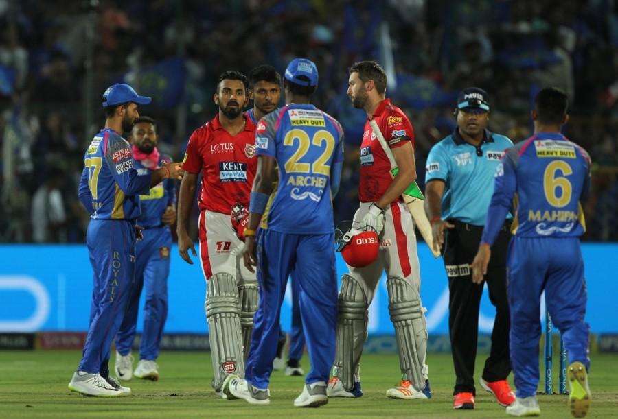 An impressive show by Rajasthan Royals' bowlers kept the side alive in the Indian Premier League (IPL) as they defeated Kings XI Punjab (KXIP) by 15 runs at the Sawai Mansingh Stadium here on Tuesday. It was the host's bowlers, who helped their side defend a moderate 158 run total against the third-placed Punjab side. Despite hunting a chaseable total, seven of the Punjab batsman didn't even touched the double digits and it was only their opener Lokesh Rahul, who single handedly fought till the last ball of the match, slamming an unbeaten 95 off 70 balls, laced with 11 fours and couple of sixes. Chasing the target, Punjab were off to a poor start as off-spinner Krishnappa Gowtham struck twice in the second over to pack back a dangerous Chris Gayle (1) and skipper Ravichandran Ashwin (0) with the visitors managing to reach just 14 runs. Rajasthan Royals,Rajasthan Royals beats Kings XI Punjab,Kings XI Punjab,Rajasthan Royals IPL,Indian Premier League,Indian Premier League 2018,Indian Premier League pics,IPL pics,IPL images,IPL stills