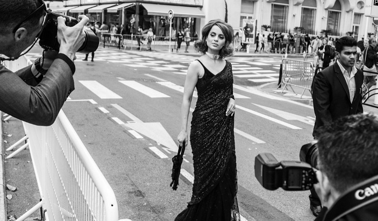 This is the "Queen" actress' first time at the gala. She is representing Grey Goose, which is celebrating cinematic excellence through its global platform Vive Le Cinema. Kangana Ranaut,actress Kangana Ranaut,Kangana Ranaut at Cannes,Kangana Ranaut in Black saree,Kangana Ranaut sensual black sari,71st Cannes Film Festival