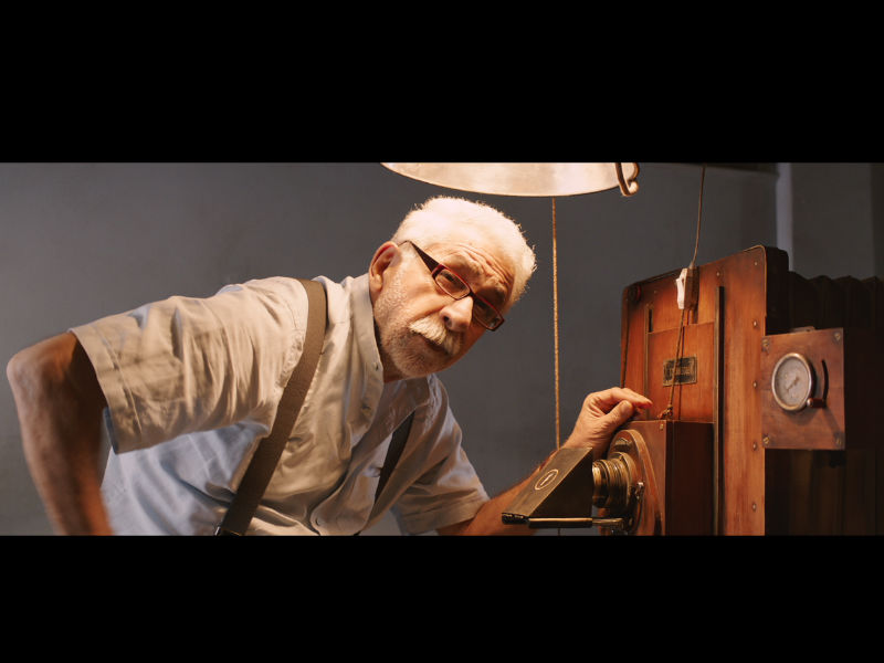 The director, a fine arts student from Kolkata used to get photo copies from an old man near his college, that old man owned a machine very similar to Mr. Soennecken in the film. It was this machine that helped Sudip make many college deadlines but soon like most old things it was time to dispose the old machine and bring in the new. In a matter of days, Sudip saw the old machine being thrown to the side and the new one being brought in. He knew right then, this was a story in the making. While he didn’t have the ability to buy the original copy machine that inspired this story. He sat with Art Director, Tapas Singha and they decided to build a Mr. Soennecken. Naseeruddin Shah,Hope aur Hum,Iconic 100 year old machine,traditional copying machine,Hope aur Hum pics,Hope aur Hum images