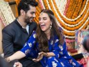 Candid pictures of couple from the intimate mehendi ceremony held in Delhi. Actress and former beauty queen Neha Dhupia surprised her fans and friends from the industry with the news of her hush-hush wedding with actor and "best friend" Angad Bedi, son of ex Indian cricketer Bishan Singh Bedi, here on Thursday. The couple will be throwing a grand bash for friends and fraternity in a couple of weeks in Mumbai. The wedding was attended by Ajay Jadeja, Ashish Nehra and Gaurav Kapoor.