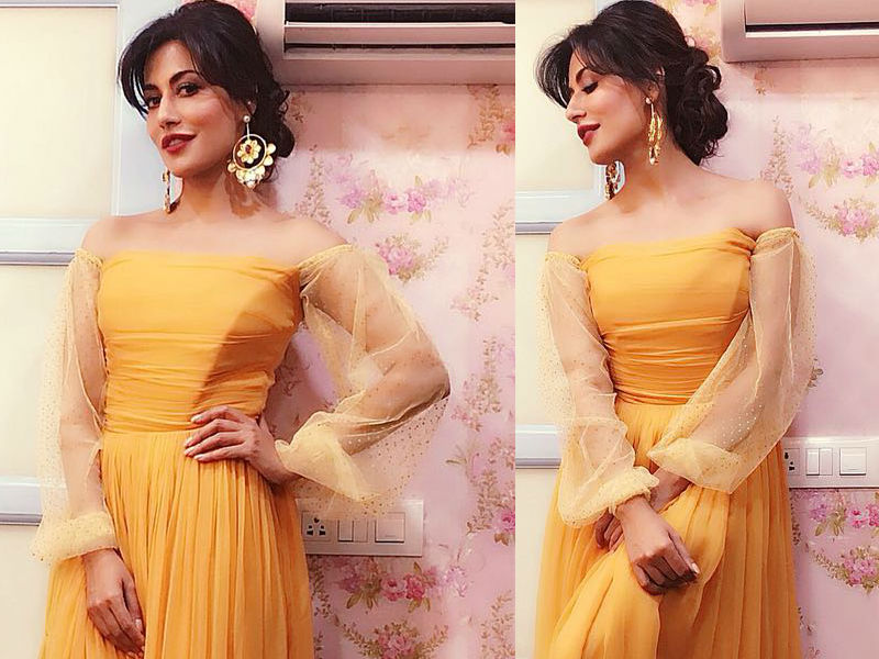 With the wedding season having hit its peak and temperatures soaring high, Chitrangada Singh showcases how to put your best foot forward at occasion while beating the heat. With minimal makeup and fuss-free dressing, Chitrangada presents two festive looks. One has the actress dressed up while keeping up with the summer heat, another look showcases Chitrangda donning a breezy Sunshine gown. She wore a Swatee Singh label, Yellow pleated dress with full net sleeves which was a lightweight dress to be carried in this hot summer. Chitrangada Singh,Chitrangada Singh wedding,Chitrangada Singh wedding dress,Chitrangada Singh summer dress,Chitrangada Singh pics,Chitrangada Singh images