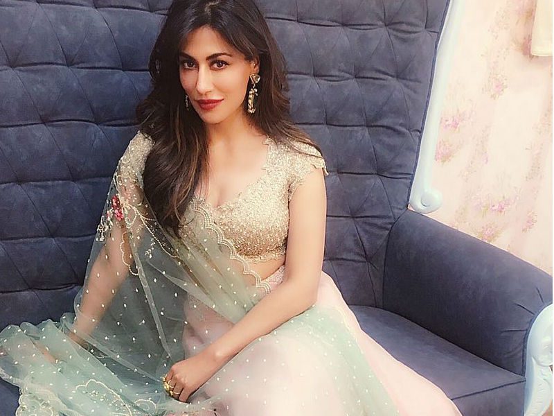 She kept it very minimal and wore diamond earrings by Zotiqq with her red pouty lips. Chitrangada completed the look by tying her up in an elegant bun. She posted the picture on her social media and wrote, "Summertime love ❤️ In a @swateesinghlabel Jwellery @azotiqque styled #lakshmilehr Mhu by @13kavitadas" Chitrangada Singh,Chitrangada Singh wedding,Chitrangada Singh wedding dress,Chitrangada Singh summer dress,Chitrangada Singh pics,Chitrangada Singh images