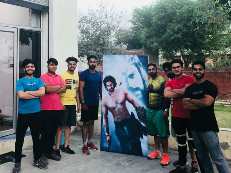 Jagseer Singh Shri a gym owner from Barnala, Punjab says, "Prabhas is the visual representation of a perfect frame: tall, dark and handsome. So much has been the impact of Prabhas’ Baahubali act that he is synonymous with strength. Encashing on his popularity and admiration that the fitness enthusiasts here in Barnala have for him, we decided to design our marketing campaign dedicated to Prabhas." Baahubali superstar,Baahubali actor,Prabhas,actor Prabhas,Prabhas turns Poster boy,Baahubali gym,Prabhas stardom